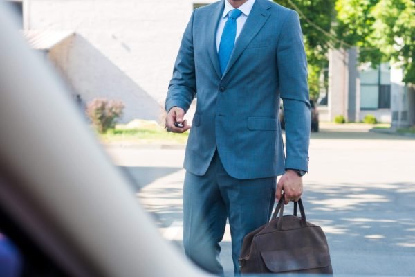 businessman-in-suit-and-eyeglasses-with-car-keys-g-2024-11-07-15-28-42-utc